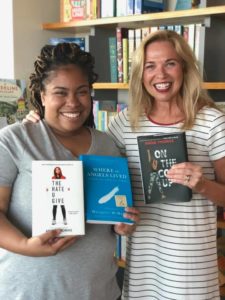 Mississippi writers Angie Thomas and Margaret McMullan hold their novels at Pass Christian Book. Photo courtesy of Scott Naugle and Pass Christian Books.