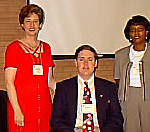 Nancy Jacobs, student computer expert, and teacher Annie Smith by Boyer Technology Summit in 1996