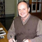 Bobby Cole signing books at the Starkville Public Library by Nancy Jacobs