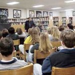 Paul Ruffin addresses students at Starkville High School during a visit in December, 2001